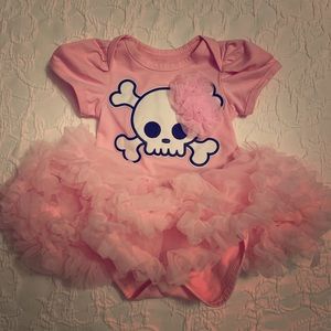 Pink skull onesie